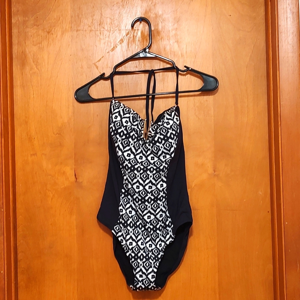 Trendy, fun, flirty bathing suit for a smaller but curvy girl.